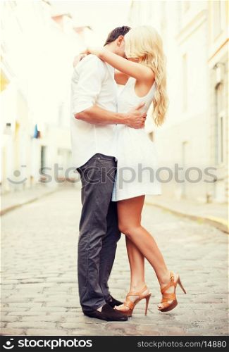 summer holidays and dating concept - couple in the city