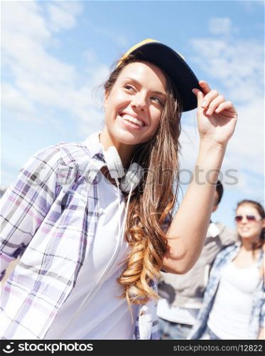 summer holidays and teenage concept - teenage girl outside