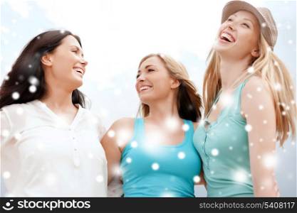 summer holidays and vacation concept - girls looking up in the sky