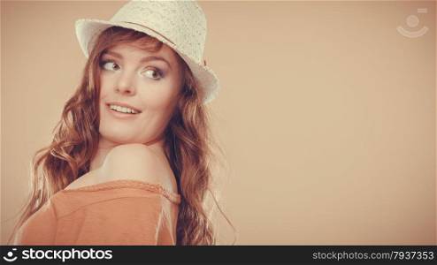 Summer holidays and vacation. Girl in fashionable clothes straw hat. Portrait of charming woman studio shot