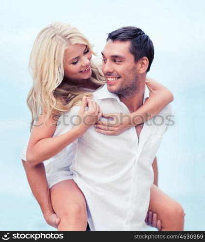 summer holidays, celebration and dating concept - couple at seaside