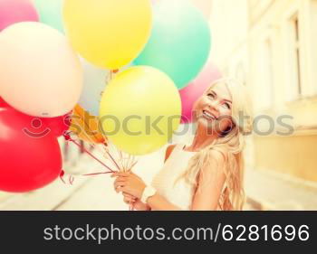 summer holidays, celebration and lifestyle concept - beautiful woman with colorful balloons in the city