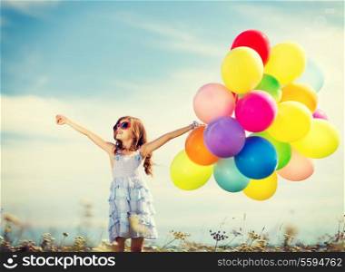 summer holidays, celebration, family, children and people concept - happy girl with colorful balloons
