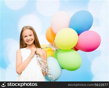 summer holidays, celebration, family, children and people concept - happy girl with colorful balloons