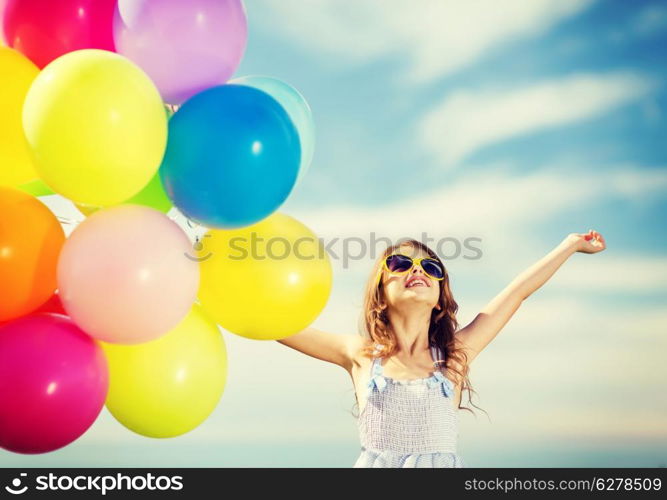 summer holidays, celebration, family, children and people concept - happy girl with colorful balloons