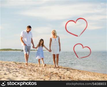 summer holidays, children and people concept - happy family walking at the seaside