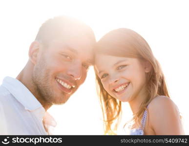 summer holidays, children and people concept - happy father and child girl having fun