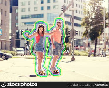 summer holidays, extreme sport and people concept - happy teenage couple riding short modern cruiser skateboards on city street with glowing lines. teenage couple riding skateboards on city street