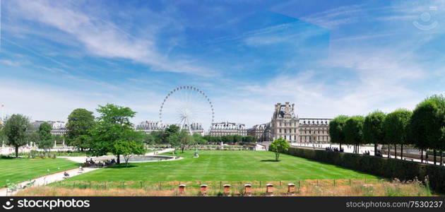 Summer holidays in Paris. Tuileries gardens with ferry wheel in front of Louvre palace, Paris France. Web banner format.. Tuileries garden, Paris