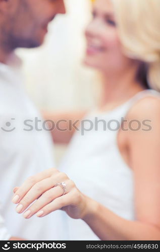 summer holidays, love, travel, tourism, relationship and dating concept - romantic man proposing to beautiful woman