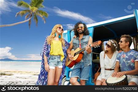 summer holidays, road trip, travel and people concept - happy young hippie friends having fun and playing music over minivan car over beach background. hippie friends playing music over minivan on beach