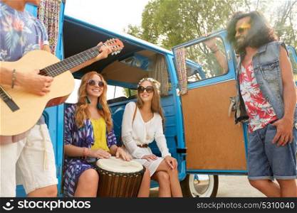 summer holidays, road trip, travel and people concept - happy young hippie friends with guitar and tom-tom drum having fun and playing music in minivan car. happy hippie friends playing music in minivan