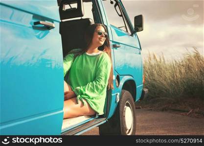 summer holidays, road trip, travel and people concept, young woman resting in minivan car
