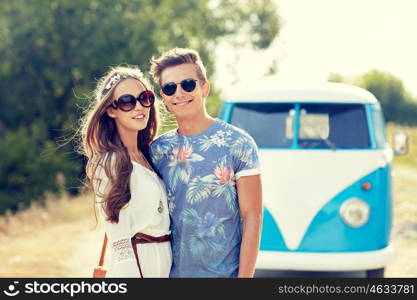 summer holidays, road trip, vacation, travel and people concept - smiling young hippie couple talking over minivan car