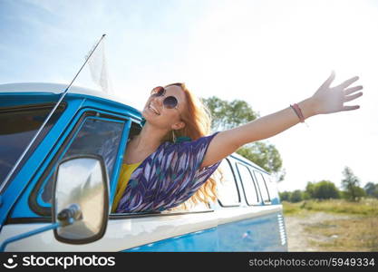 summer holidays, road trip, vacation, travel and people concept - smiling young hippie woman driving minivan car and waving hand