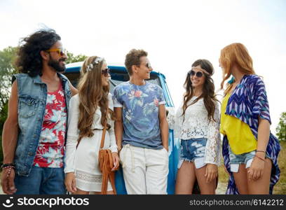 summer holidays, road trip, vacation, travel and people concept - smiling young hippie friends over minivan car