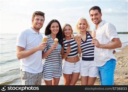 summer, holidays, sea, tourism and people concept - group of smiling friends eating ice cream on beach