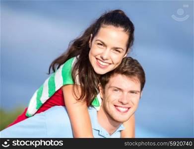 summer holidays, tourism, travel, relations and people concept - group of happy couple having fun outdoors