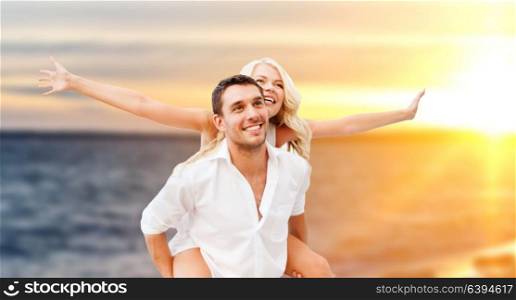 summer holidays, travel, tourism and people concept - happy couple over sea background. happy couple over sea background