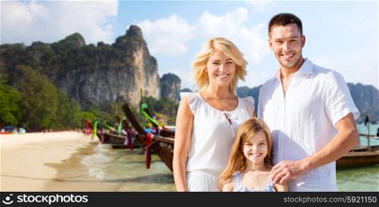 summer holidays, travel, tourism, children and people concept - happy family over beach in thailand or bali background