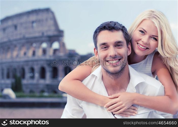 summer holidays, travel, tourism, people and dating concept - happy couple hugging over coliseum background