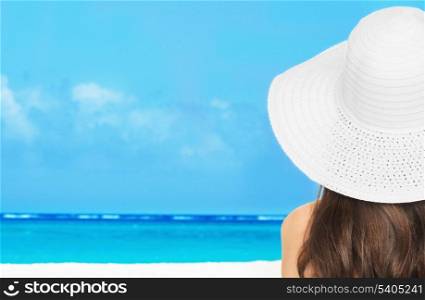 summer holidays, vacation and beach concept - girl posing in bikini on the beach