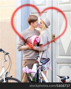 summer holidays, vacation, bikes, love and relationship concept - couple with bicycles in the city