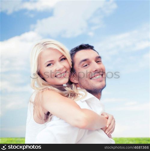 summer holidays, vacation, dating, love and people concept - happy couple having fun over poppy flowers field and blue sky background