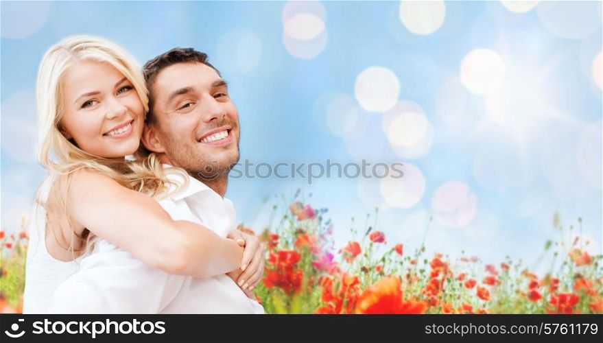 summer holidays, vacation, dating, love and people concept - happy couple having fun over poppy flowers field and blue sky background