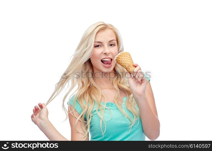 summer, junk food and people concept - young woman in sunglasses eating ice cream