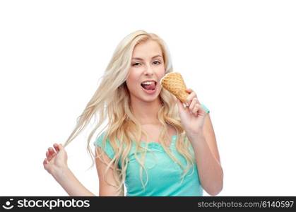 summer, junk food and people concept - young woman in sunglasses eating ice cream