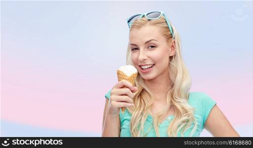 summer, junk food and people concept - young woman or teenage girl in sunglasses eating ice cream over pink background