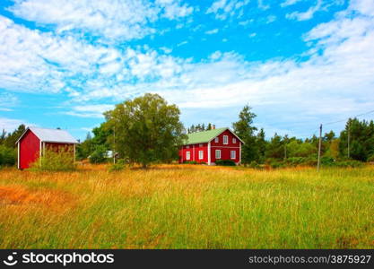 Summer landscape and blue sky with houdes