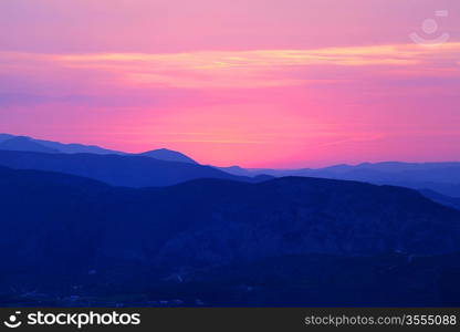 Summer landscape in mountains with the sun