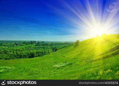 summer landscape of green valley and blue sky