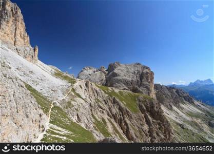 summer landscape on Catinaccio Dolomites, on background Mugoni mount