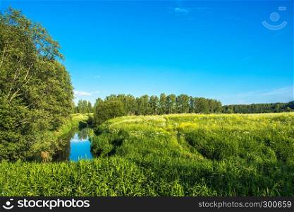 Summer landscape with a small river in the Central part of Russia.