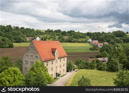 Summer landscape with green fields and trees in a german village in the region of Baden Wurttemberg