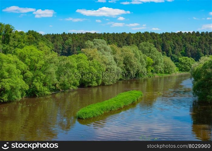 Summer landscape with river, forest, sky and clouds