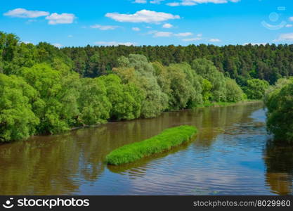 Summer landscape with river, forest, sky and clouds