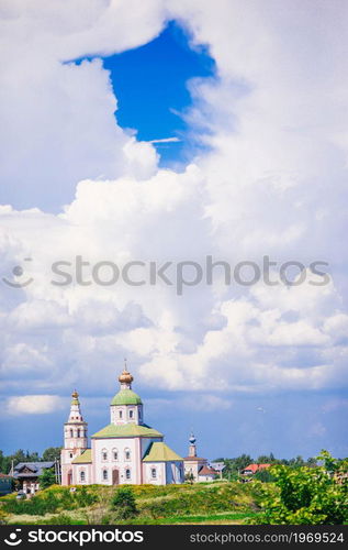 Summer landscape with views of the Suzdal Kremlin. Suzdal - is one of the cities tourist route called Golden Ring of Russia.. Summer landscape with views of the Suzdal Kremlin.