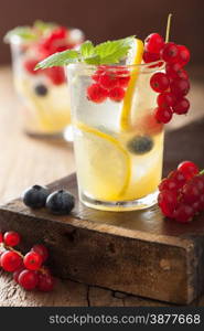 summer lemonade with berry and lemon