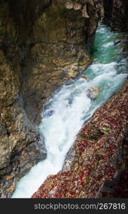 Summer Liechtensteinklamm gorge with stream and waterfalls in Austria.