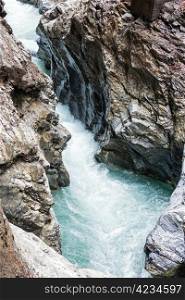 Summer Liechtensteinklamm gorge with stream and waterfalls in Austria.