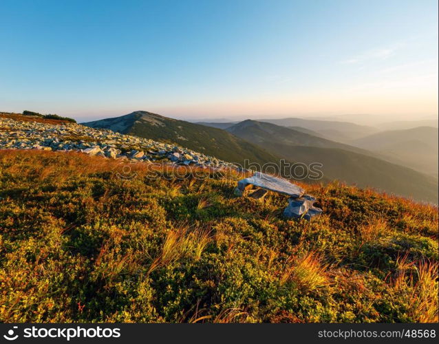 Summer morning Carpathian mountain top view from stony summit of Ihrovets Mount (Gorgany, Ukraine).