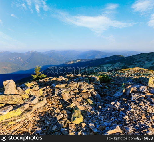 Summer morning Carpathian mountain top view from stony summit of Ihrovets Mount (Gorgany, Ukraine).