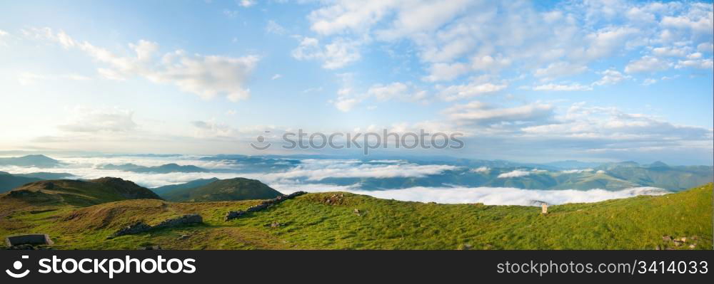 Summer morning cloudy mountain panorama view (Ukraine, Carpathian Mountains). Three shots stitch image.