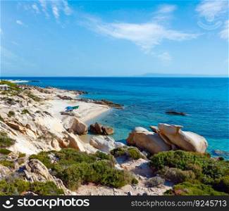 Summer morning rocky Aegean coast with sandy beach and c&ing near Platanitsi Beach  Sithonia Peninsula, Chalcidice, Greece .