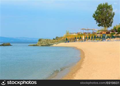 Summer morning sandy Tristinika beach view(Sithonia, Chalkidiki, Greece).