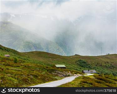 Summer mountain cloudy countryside landscape from Aurlandsfjellet National Scenic Route highlands road, Norway